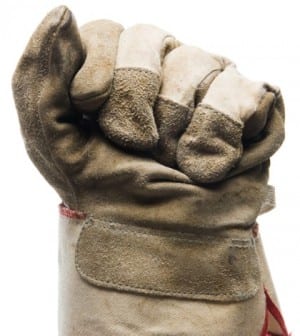 Close-up of canvas work glove on fist