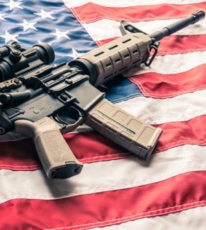 Gun on American Flag