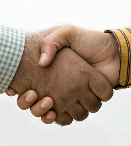 A image showing a handshake of common senior & young mans handshake on isolated white background. A conceptual image for agreement in generation gap.