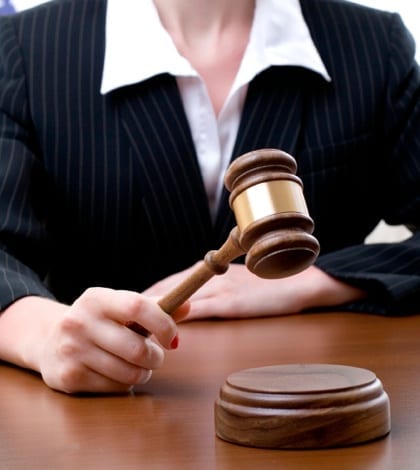 Female judge with US flag on the background