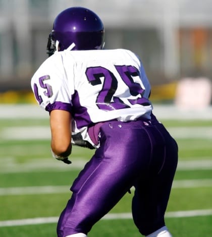 iStock_football player purple iStock_football player purple