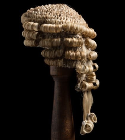 Side view of an antique barrister's wig made of horsehair
