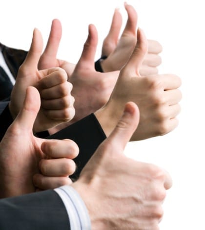 Businesspeople hands showing okay sign