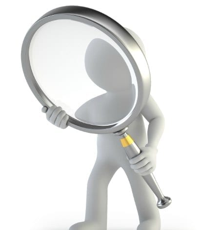 little man looking through a magnifying glass little man looking through a magnifying glass