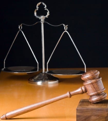 Gavel and Scale Gavel and Scale of justice - close up. Selective focus.