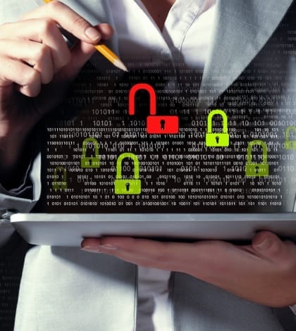 Businesswoman holding tablet pc Businesswoman holding tablet pc entering password. Security concept