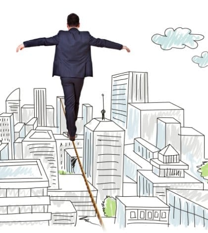 businessman balancing on tightrope city businessman balancing on tightrope city