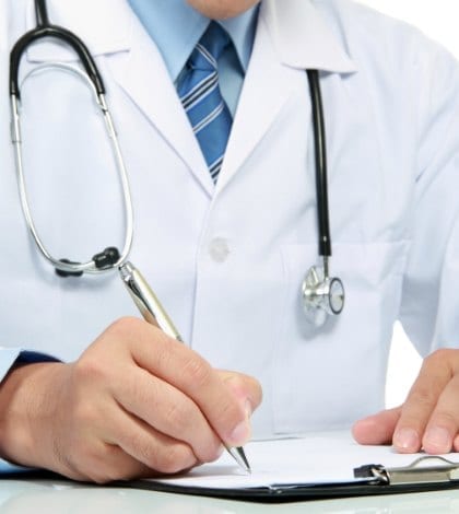 gesture of medical doctor's hand writing a note gesture of medical doctor's hand writing a note