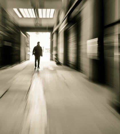 people through doorway at a factory building,motion blur people through doorway at a factory building,motion blur