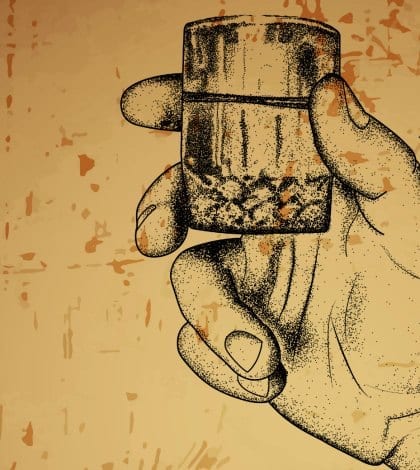 Hand holding an alcoholic drink,offset printing Hand holding an alcoholic drink,offset printing