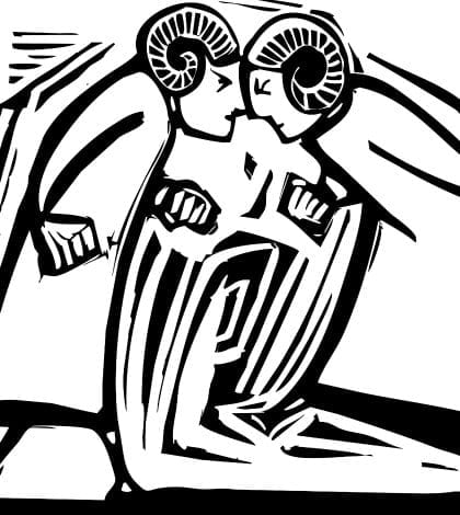 Two men with ram's horns bash their heads together. Two men with ram's horns bash their heads together.