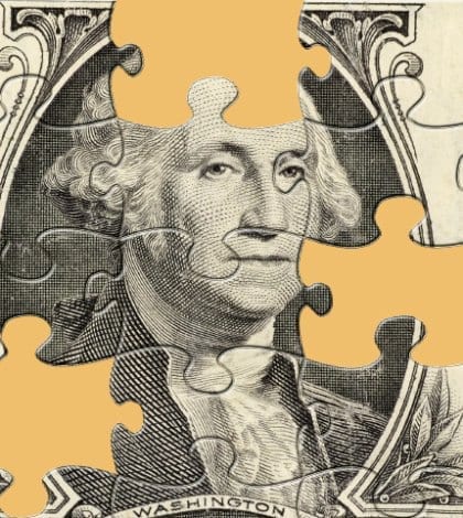 Dollar Puzzle With Missing Pieces.  Clipping Path For Puzzle Included.