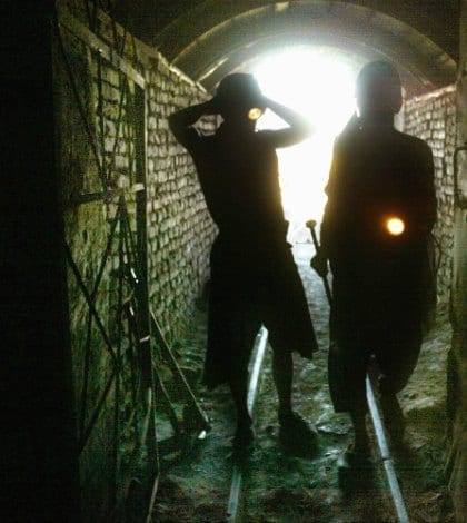 miners tunnel coal tracks 000017964437 420 KARKAR, AFGHANISTAN-OCTOBER 30: Afghan coal miners adjust their lights on their helmets at the entrance of the Karkar mine October 30,2004 Karkar, Afghanistan. The mine is the most active one in the country, producing coal for the country for the upcoming winter season. There are 160 mine workers working 2 shifts producing 55 tons of coal per day which has been in operation for 57 years and was active during the Taliban years as well. The workers make less than $4.00 a day.
(photo by Paula Bronstein/Getty Images)