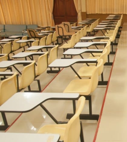 Lecture chairs in a class room with stair path Lecture chairs in a class room with stair path