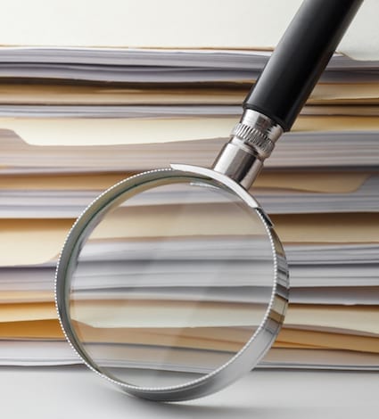 Documents Search File Stack and Magnifying Glass