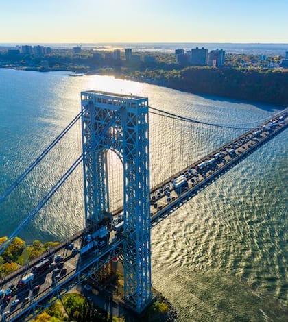 George Washington Bridge, NYC, rush hour, view from helicopter, silhouette George Washington Bridge, NYC, rush hour, view from helicopter, silhouette