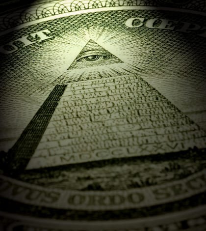 Eye and pyramid, one dollar bill Detail of an american one dollar bill with dramtic light