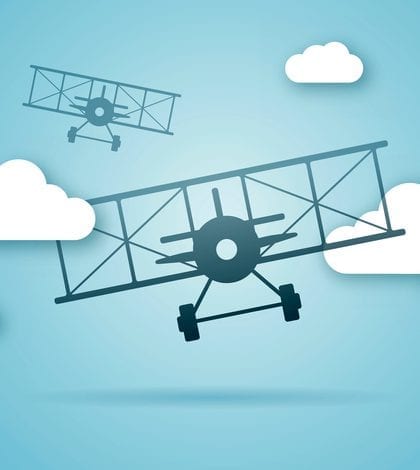 Biplanes flying forward in the clouds. EPS 10 file. Transparency effects used on highlight elements.