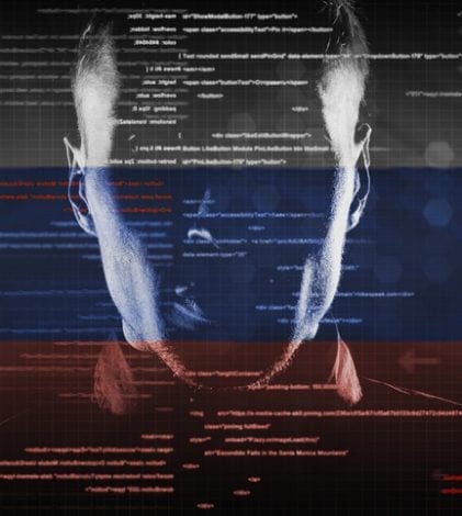 20171030_081519 hacker at work with graphic user interface around with russian flag on background