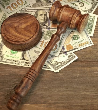 Judges or Auctioneer Gavel And Money On The Wooden Table Concept For Corruption, Bankruptcy Court, Bail, Crime, Bribing, Fraud, Auction Bidding. Judges or Auctioneer Gavel, Soundboard And Bundle Of Dollar Cash On The Rough Wooden Textured Table Background.