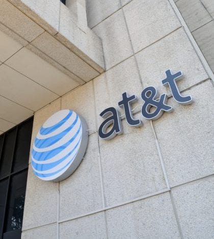 AT&T Logo on Office Building Little Rock, AR, United States - May 28, 2012: American Telephone and Telegraph logo on the side of one of its office buildings in downtown Little Rock. AT&T Inc. is headquartered in Dallas, Texas and is one of the largest providers of wired and wireless voice and data, broadband internet, TV and messaging services in the United States.