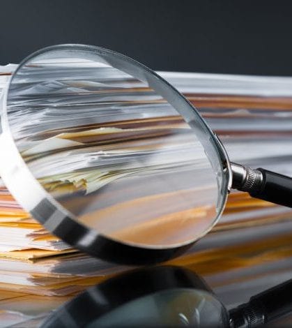 Documents Search File Stack and Magnifying Glass