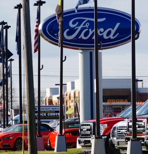 Ford Rochester Hills, Michigan, USA - March 21, 2016: The Huntington Ford dealership on Rochester Road in Rochester Hills, Michigan. Founded in 1903 by Henry Ford, Ford Motor Company is a multi-national manufacturer of cars and trucks.