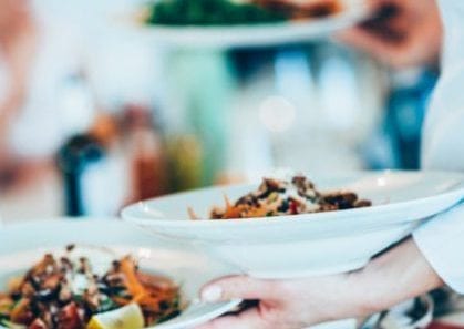 Serving food in restaurant