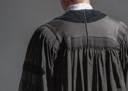 Back view of a young judge