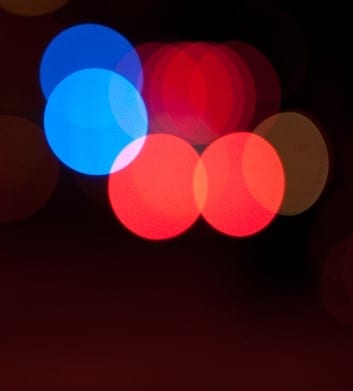 Blurred lights from emergency vehicles at night Blurred lights from emergency vehicles at night