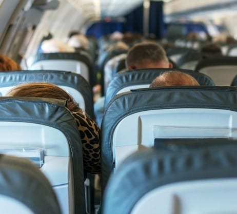 Interior inside of the plane with passengers. Interior inside of the plane with passengers.