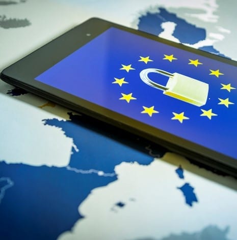 Padlock and EU flag inside smartphone and EU map, symbolizing the EU General Data Protection Regulation or GDPR. Designed to harmonize data privacy laws across Europe.
