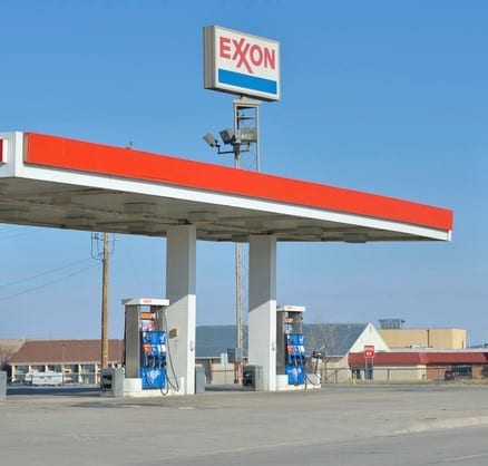 Exxon "Rapid City, South Dakota, USA - April 1, 2013: An Exxon gas station in Rapid City. ExxonMobil is a multinational oil and gas company and one of the largest corporations in the world."