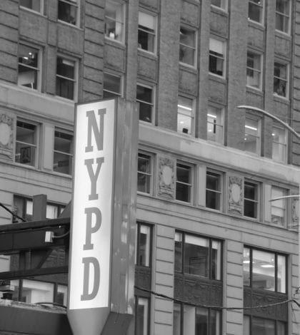 New York City, United States - April 20, 2017:  Police station at Times Square New York City.
In the photo you can see the station sign, Buildings and architecture in black and white