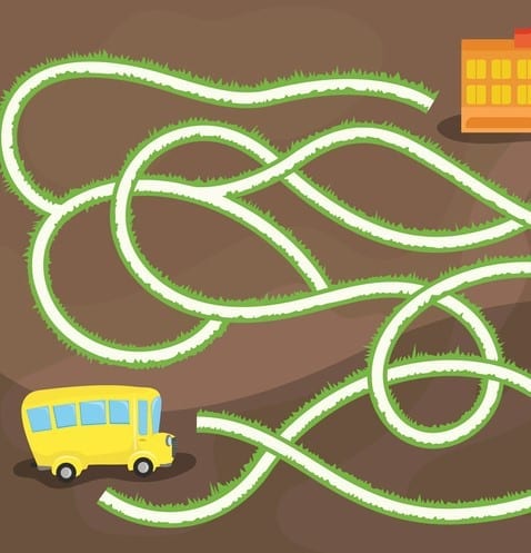 Vector maze game with school bus way to the school