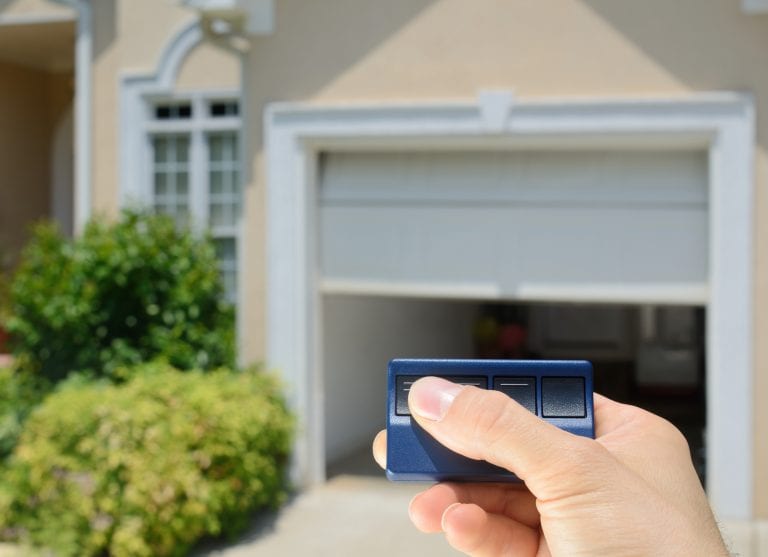 Garage Door Opener Garage Door Opener opening a residential garage door.
