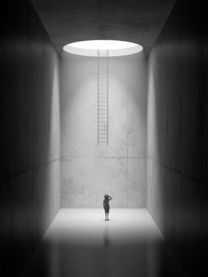Trapped woman A woman standing at the bottom of an empty concrete space, unable to get out. 3D render