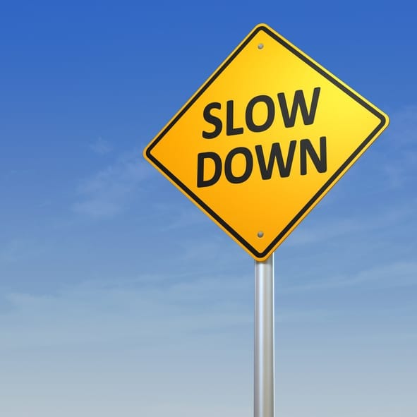 Slow Down Warning Sign Road Warning Sign - Slow Down.Digitally generated 3d image.