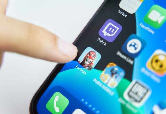 Iphone Apps. Bishkek, Kyrgyzstan - July 6 2019: Fortnite app in play smartphone. close-up on screen iphone.