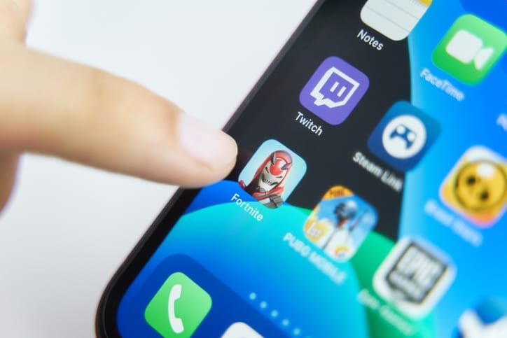 Iphone Apps. Bishkek, Kyrgyzstan - July 6 2019: Fortnite app in play smartphone. close-up on screen iphone.