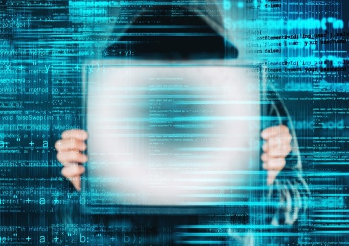 Ransomware computer virus concept Ransomware computer virus concept, hacker with monitor screen. Internet and cyber security concept