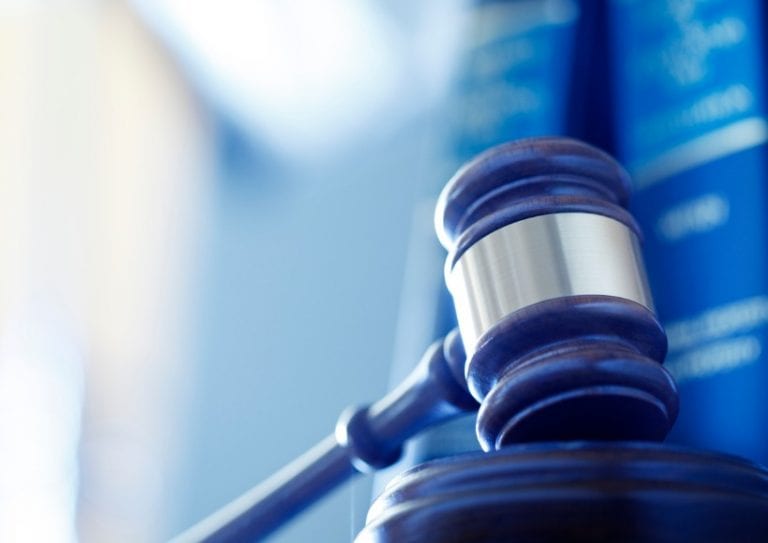 gavel-in-front-of-row-of-law-books-picture-id637294178 gavel-in-front-of-row-of-law-books-picture-id637294178