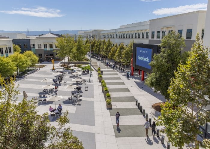 Facebook Menlo Park Campus Headquarters Menlo Park, California United States - August 29, 2016: Looking out at the main campus of Facebook headquarters in Menlo Park California, the online social media and social networking service started in 2004 by Mark Zuckerberg.