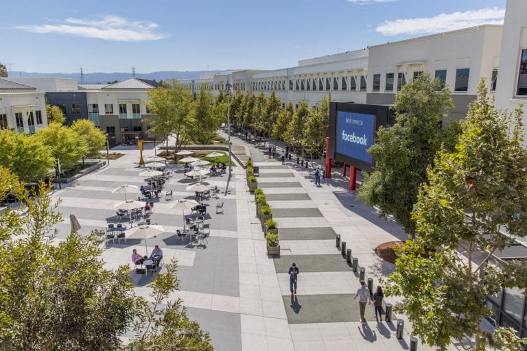 Facebook Menlo Park Campus Headquarters Menlo Park, California United States - August 29, 2016: Looking out at the main campus of Facebook headquarters in Menlo Park California, the online social media and social networking service started in 2004 by Mark Zuckerberg.