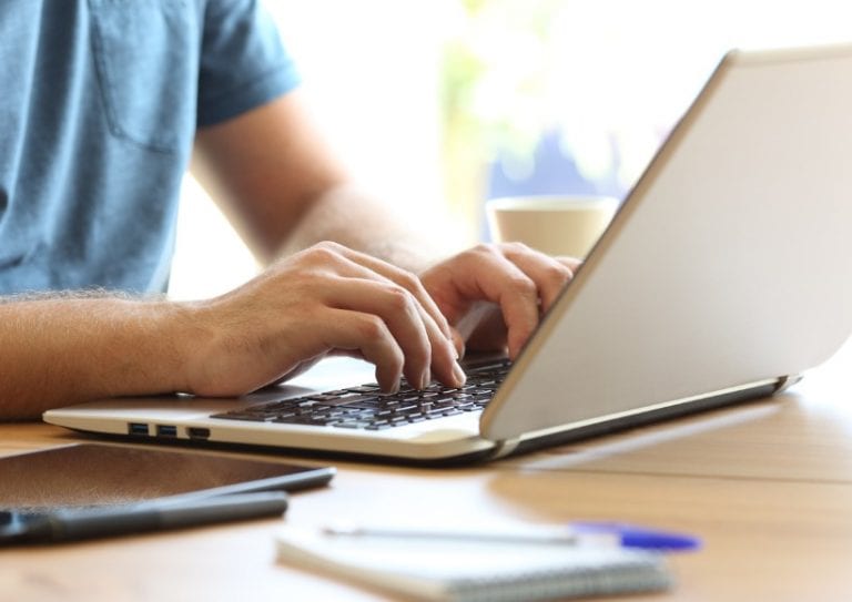 man-hands-typing-on-a-laptop-keyboard-on-a-desk-picture-id865728066 man-hands-typing-on-a-laptop-keyboard-on-a-desk-picture-id865728066
