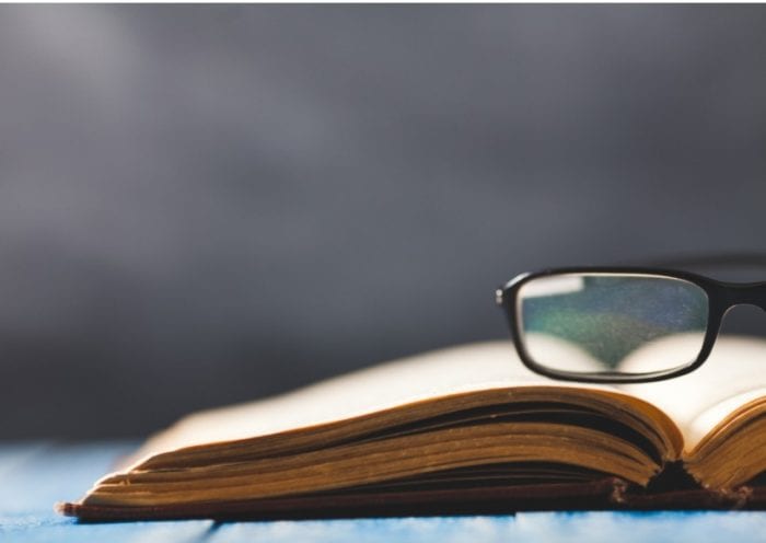 opened-book-on-wooden-table-picture-id813343236 opened-book-on-wooden-table-picture-id813343236