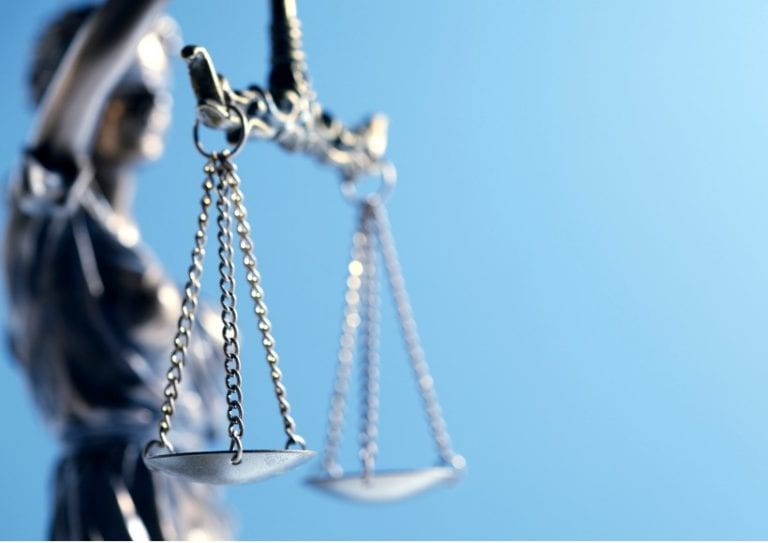 statue-of-lady-justice-in-front-of-blue-background-picture-id970388564 statue-of-lady-justice-in-front-of-blue-background-picture-id970388564