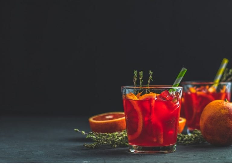 campari-traditional-italian-alcoholic-liqueur-on-black-concrete-picture-id1097845668 campari-traditional-italian-alcoholic-liqueur-on-black-concrete-picture-id1097845668