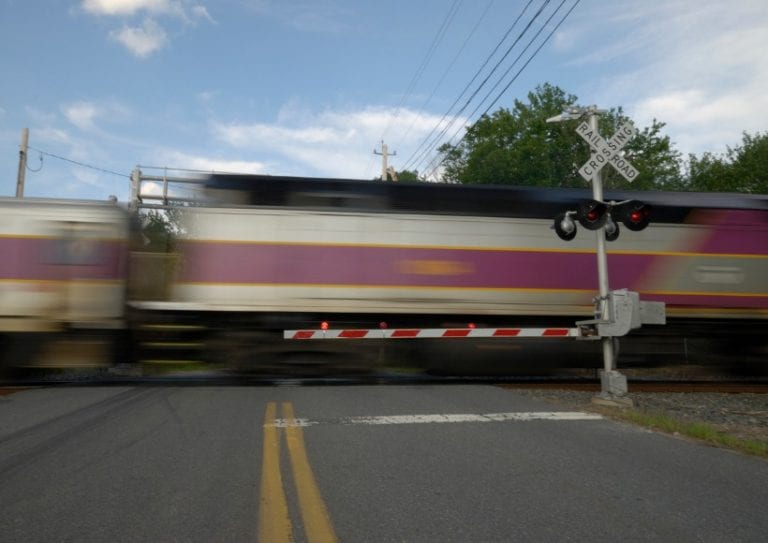 speeding-train-crossing-a-street-picture-id91703368 speeding-train-crossing-a-street-picture-id91703368
