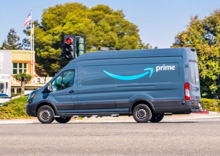 Oct 10, 2019 Mountain View / CA / USA - Amazon van branded with the Amazon Prime logo, making deliveries in San Francisco bay area
